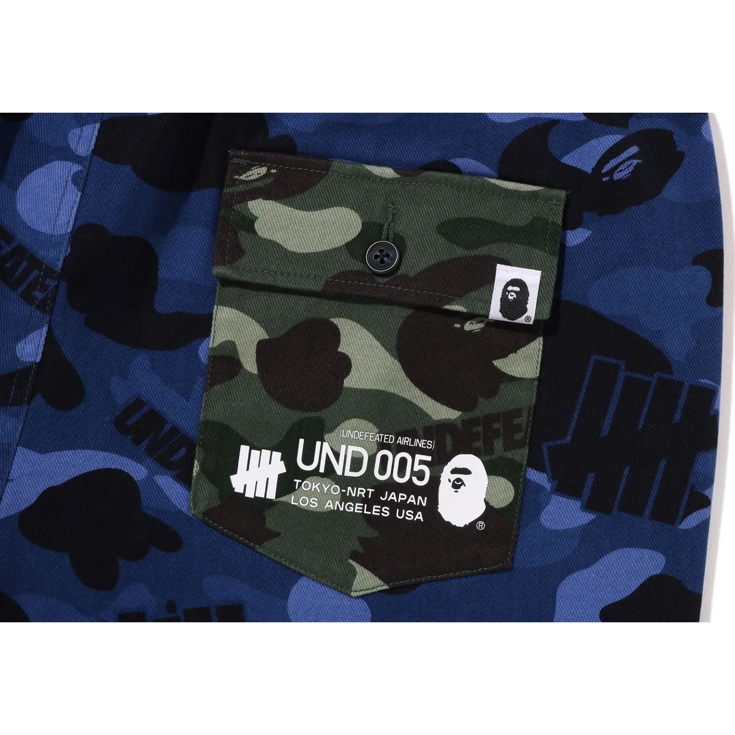 BAPE X UNDEFEATED COLOR CAMO FLANNEL PANTS MENS