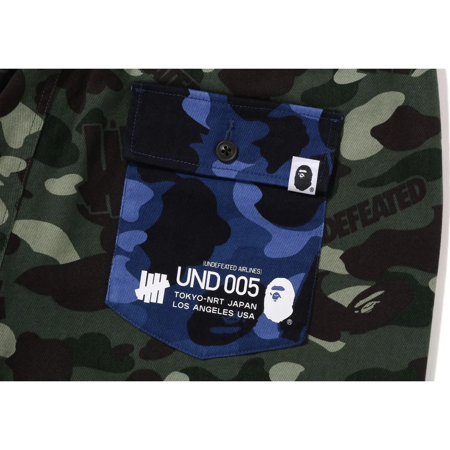 BAPE X UNDEFEATED COLOR CAMO FLANNEL PANTS MENS