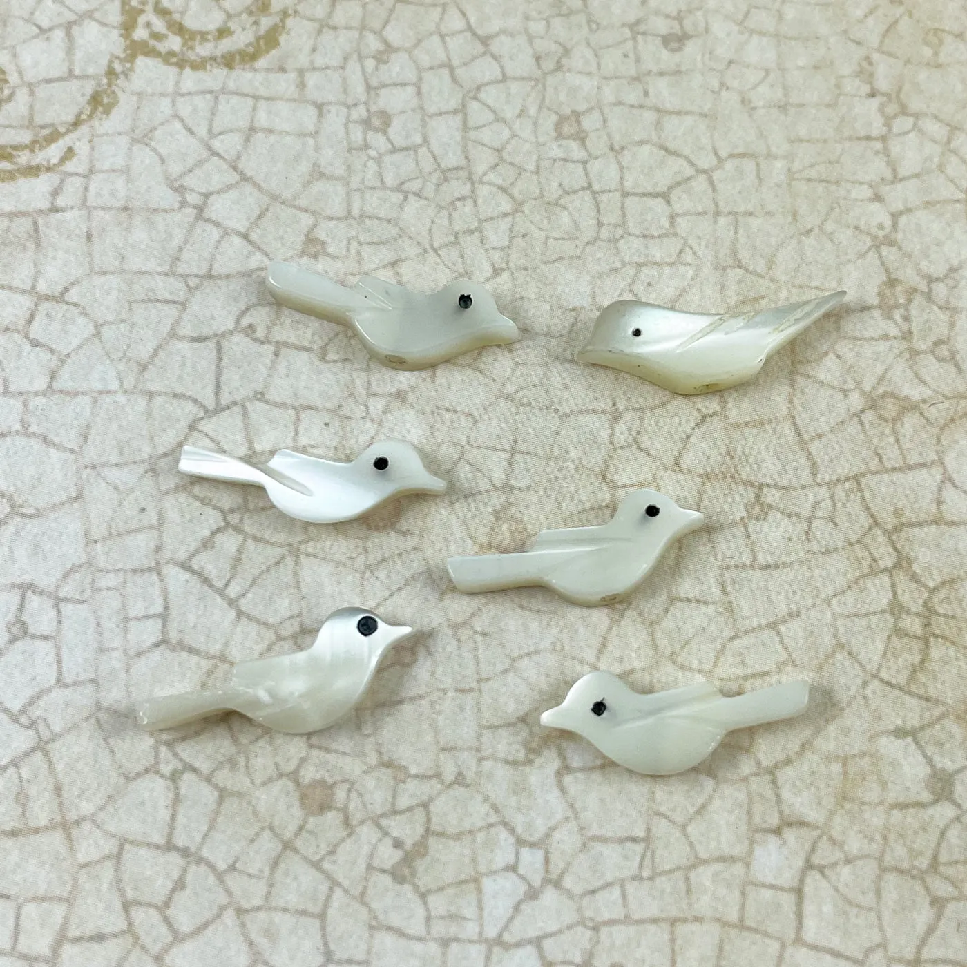 Carved Mother of Pearl Fetish Bird Beads