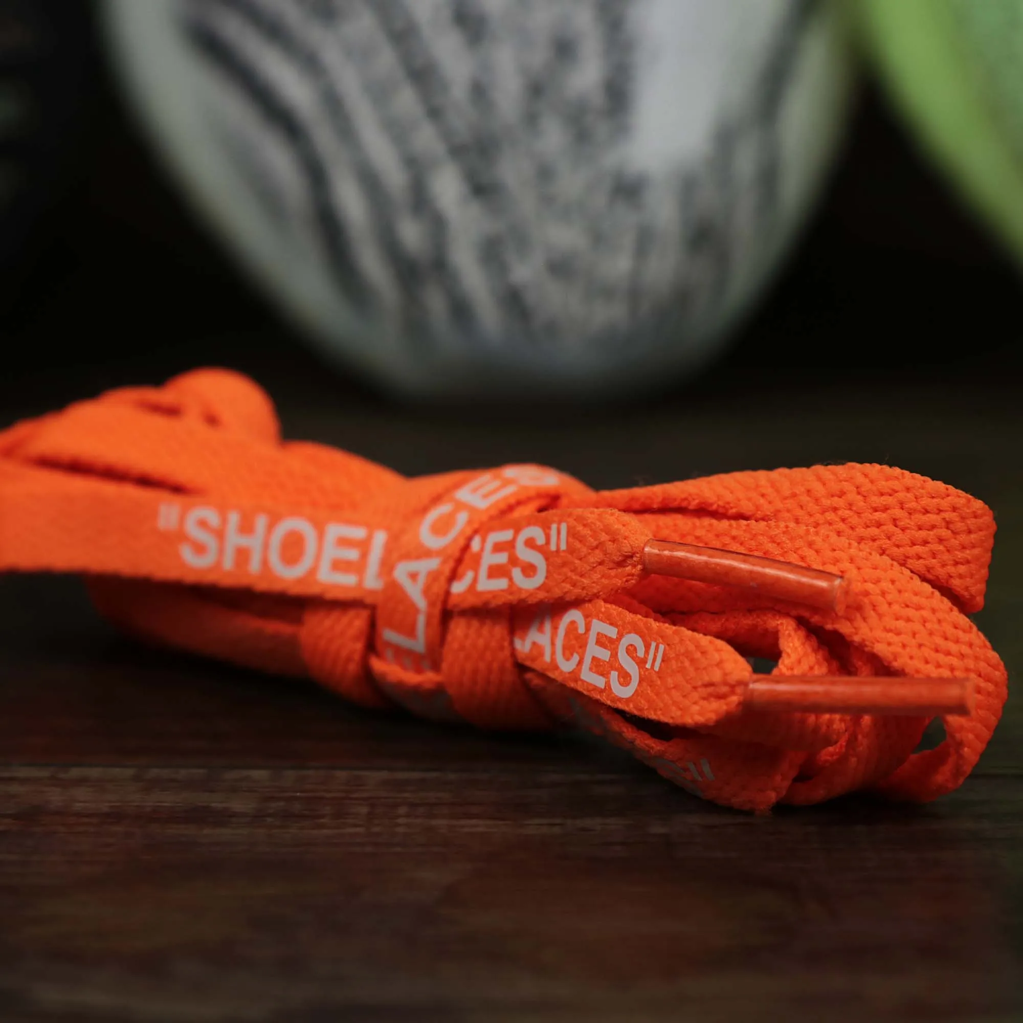 Flat Orange Shoelaces with “Shoelaces” Print | 120cm Capswag