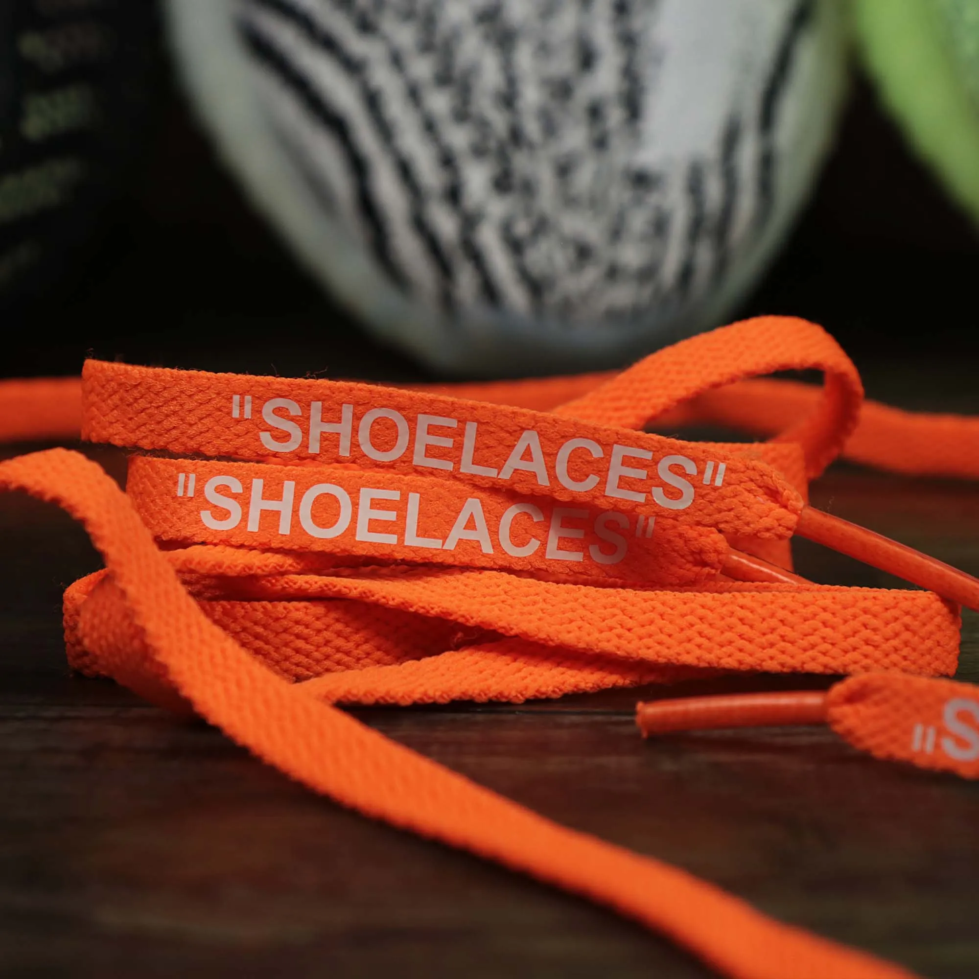 Flat Orange Shoelaces with “Shoelaces” Print | 120cm Capswag